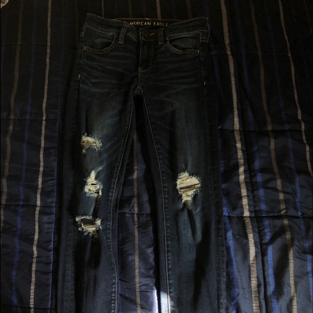 dark american eagle ripped skinny jeans